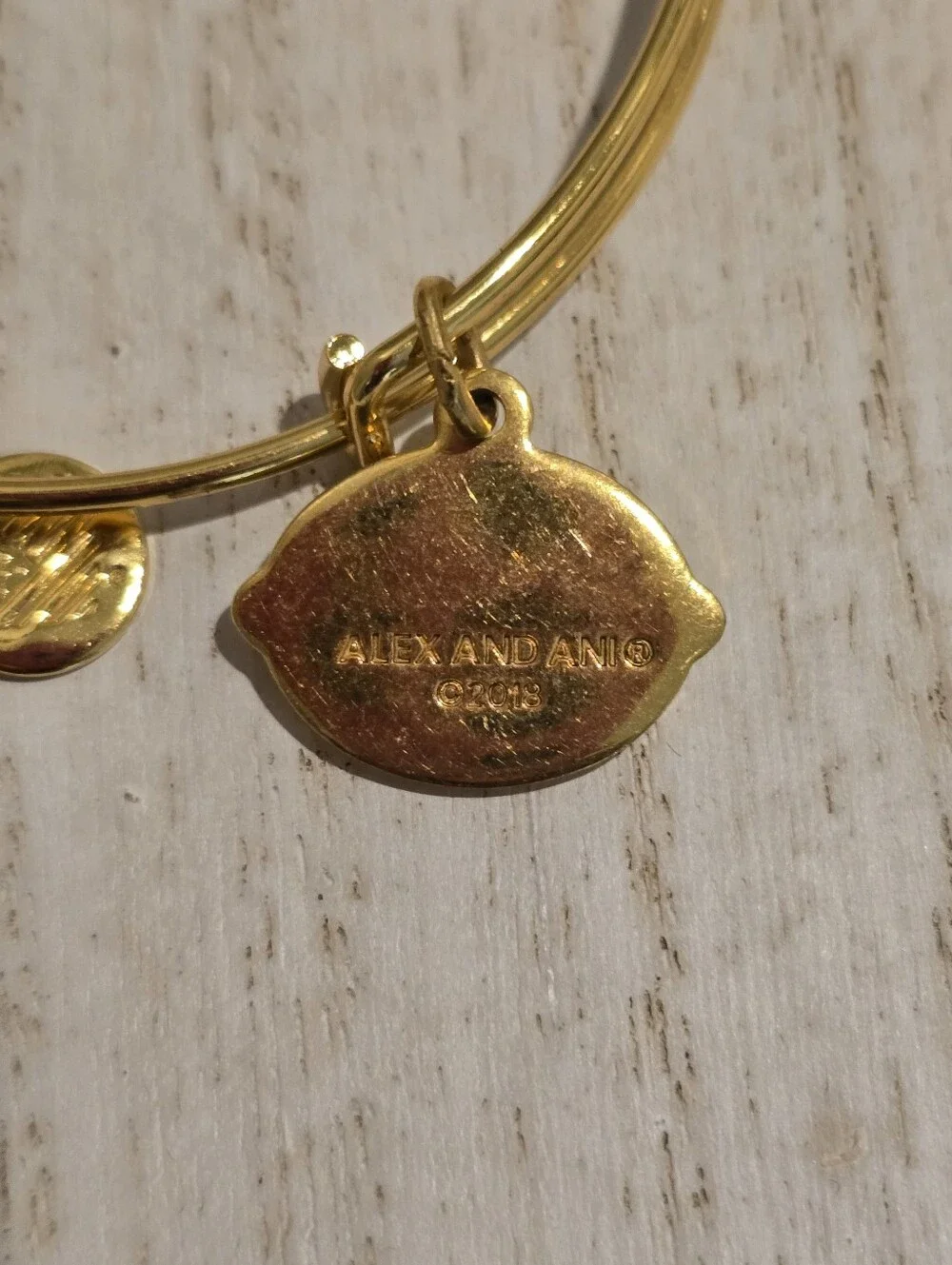 Alex and Ani Gold Tone Charm Bangle with Lemon Motto